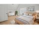 Bright bedroom with a large window, comfortable bed, and ample storage space, perfect for relaxing at 1409 Rheo Nw Ct, Concord, NC 28027