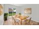 Bright dining room featuring a sliding glass door to the backyard, great for entertaining at 1409 Rheo Nw Ct, Concord, NC 28027