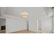 Another view of the spacious main bedroom features recessed lights and entry to main bathroom at 1409 Rheo Nw Ct, Concord, NC 28027