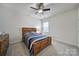 Cozy bedroom with carpet, ceiling fan, and a window at 1497 Tranquility Blvd # 417, Lancaster, SC 29720