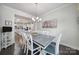 Dining room with view into the bright modern kitchen with large center island at 1497 Tranquility Blvd # 417, Lancaster, SC 29720