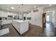 Spacious kitchen with a large island, stainless steel appliances, and ample cabinet space for storage at 1497 Tranquility Blvd # 417, Lancaster, SC 29720