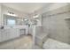 Modern main bathroom with walk-in shower and dual vanities at 1497 Tranquility Blvd # 417, Lancaster, SC 29720