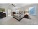 Comfortable main bedroom with ensuite bathroom and large windows at 1497 Tranquility Blvd # 417, Lancaster, SC 29720
