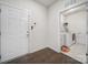 Convenient mud room leads to laundry room with ample storage and a utility sink at 1497 Tranquility Blvd # 417, Lancaster, SC 29720