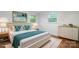 Bright bedroom featuring hardwood floors, modern furniture, and stylish decor at 1500 19Th Avenue Ne Pl, Hickory, NC 28601