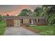 Charming brick home with well-manicured lawn and inviting entrance at sunset at 1500 19Th Avenue Ne Pl, Hickory, NC 28601