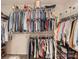 Spacious walk-in closet with extensive shelving and hanging space for optimal organization and storage at 15116 Caspian Way, Charlotte, NC 28278