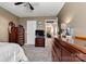 Neutral bedroom featuring a ceiling fan, and dark wood furniture at 152 Blossom Ridge Dr, Mooresville, NC 28117