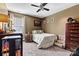 Comfortable bedroom with a bed, window, closet, and decor on the walls at 152 Blossom Ridge Dr, Mooresville, NC 28117