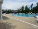 Community pool and recreation area featuring a large swimming pool and ample deck space with lounge chairs at 152 Blossom Ridge Dr, Mooresville, NC 28117