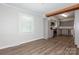 Open concept living area connected to a beautifully updated kitchen with stainless appliances and wood countertops at 1637 Buckingham Ave, Gastonia, NC 28054