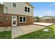 Spacious backyard featuring a patio and wooden deck, perfect for outdoor entertaining and relaxation at 1766 Colony Rd, Rock Hill, SC 29730