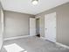 Bright bedroom featuring neutral tones, carpet flooring, and natural light at 1766 Colony Rd, Rock Hill, SC 29730