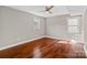 This bedroom features hardwood floors, a ceiling fan, and natural light at 1766 Colony Rd, Rock Hill, SC 29730