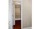 View of a walk-in closet with custom shelving and hardwood floors at 1766 Colony Rd, Rock Hill, SC 29730