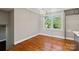 Dining room features hardwood floors, natural lighting, and modern chandelier at 1766 Colony Rd, Rock Hill, SC 29730