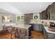Updated kitchen featuring stainless steel appliances, gray cabinets, and a kitchen island at 1766 Colony Rd, Rock Hill, SC 29730