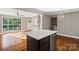 Open-concept living area with a large window and hardwood floors at 1766 Colony Rd, Rock Hill, SC 29730