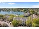 Stunning aerial view of lakeside apartments with a marina, docks, and lush greenery surrounding the community at 18700 Nautical Dr # 203, Cornelius, NC 28031