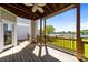 Spacious balcony with wood flooring and railings offers stunning lake views at 18700 Nautical Dr # 203, Cornelius, NC 28031