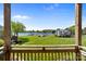 Breathtaking lake view from the balcony overlooking lush lawns and a serene harbor at 18700 Nautical Dr # 203, Cornelius, NC 28031