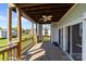 Inviting outdoor patio featuring stylish wicker furniture and a ceiling fan for relaxing and enjoying the views at 18700 Nautical Dr # 203, Cornelius, NC 28031
