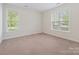 Bedroom with neutral carpet and multiple windows at 1910 Mezzo Ct, Matthews, NC 28105