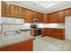 Well-equipped kitchen with stainless steel appliances, granite countertops, and ample cabinetry at 1910 Mezzo Ct, Matthews, NC 28105