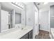 Bright bathroom with large mirror and modern fixtures at 2059 Lennox Square Rd, Charlotte, NC 28210