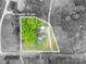 Aerial view of property lot lines and surrounding trees and road at 211 Hershel Lackey Rd, Lincolnton, NC 28092