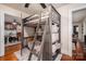 Shared ' bedroom featuring a bunk bed with storage, and a view to a dining area at 211 Hershel Lackey Rd, Lincolnton, NC 28092