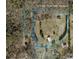 Aerial view of 9.32 acre lot surrounded by mature trees and featuring two structures at 228 Red Dog Dr, Mooresville, NC 28115