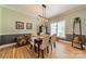 Bright dining room featuring a modern light fixture, and a cozy seating area at 228 Red Dog Dr, Mooresville, NC 28115