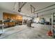 Spacious three-car garage with ample storage and workspace at 228 Red Dog Dr, Mooresville, NC 28115