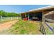 Open shed featuring several pieces of farming equipment at 228 Red Dog Dr, Mooresville, NC 28115