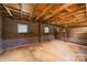 Interior of wooden stall with concrete block walls and grated windows at 228 Red Dog Dr, Mooresville, NC 28115