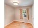 Empty bedroom with neutral walls and wood floors at 2614 Thornton Rd, Charlotte, NC 28208