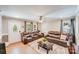 Living room with neutral walls, modern seating, and a cozy rug at 2614 Thornton Rd, Charlotte, NC 28208