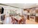 Open floor plan showcasing the kitchen and living room with hardwood floors at 2614 Thornton Rd, Charlotte, NC 28208