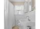 Bathroom featuring a toilet, sink and bathtub with a shower at 2721 Albany Ln, Charlotte, NC 28205