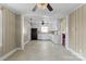 Spacious kitchen with tile flooring, white cabinets, and modern appliances at 2721 Albany Ln, Charlotte, NC 28205