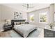 Bright bedroom with neutral walls, luxury vinyl plank flooring, and dual windows for ample natural light at 3804 Freedom Dr, Charlotte, NC 28208
