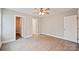 Spacious bedroom with neutral walls and wood-look flooring at 417 Spring Sw St, Concord, NC 28025