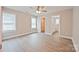 Spacious bedroom with neutral walls, ceiling fan and two windows with blinds at 417 Spring Sw St, Concord, NC 28025