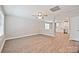 Inviting living room with an open-concept design, featuring hardwood floors, and a ceiling fan at 417 Spring Sw St, Concord, NC 28025