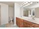This bathroom features a dual vanity, a commode, and a glass shower at 428 Whitewater Nw Way, Concord, NC 28027