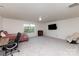 Generous bedroom with neutral walls, ceiling fan, and lots of natural light to create a cozy atmosphere at 428 Whitewater Nw Way, Concord, NC 28027