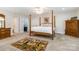 Comfortable bedroom with wood furniture and carpet flooring at 4925 Pageland Hwy, Monroe, NC 28112
