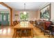 Spacious dining room with hardwood floors, large window, and elegant decor at 4925 Pageland Hwy, Monroe, NC 28112